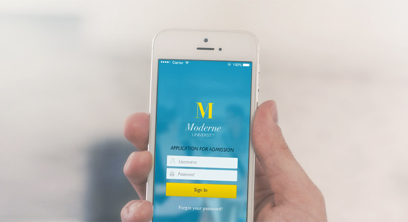 Hand holding iPhone with Moderne University's iOS app on the screen